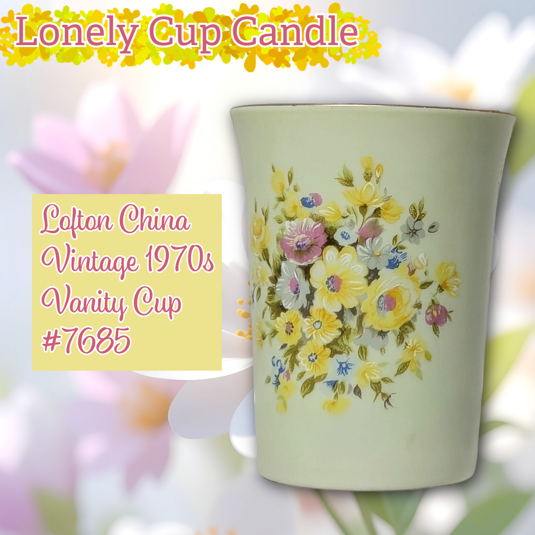 Vintage-style ceramic cup with floral design and text indicating Lofton China and a vintage year.